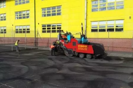 RESURFACING PLAY AREAS AND ROAD